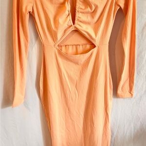 Royalty by Maluma in the color Peach Fuzz